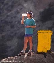 A woman mountain biking; Actual size=180 pixels wide